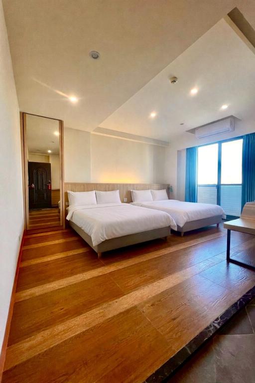 CP HOTEL ジンメン (CP HOTEL Kinmen) 客室内ベッド