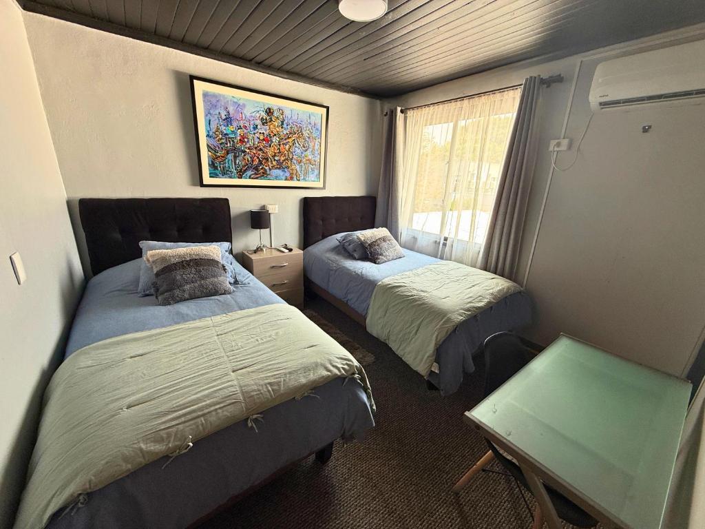Hospedaje céntrico con AACC, baño privado, TV con plataformas y espacio cowork - 5