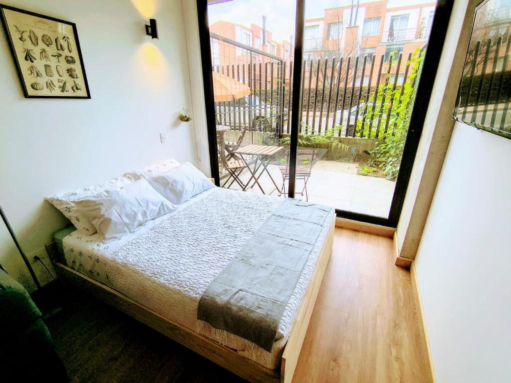 Acogedor apartamento con jardín - 1
