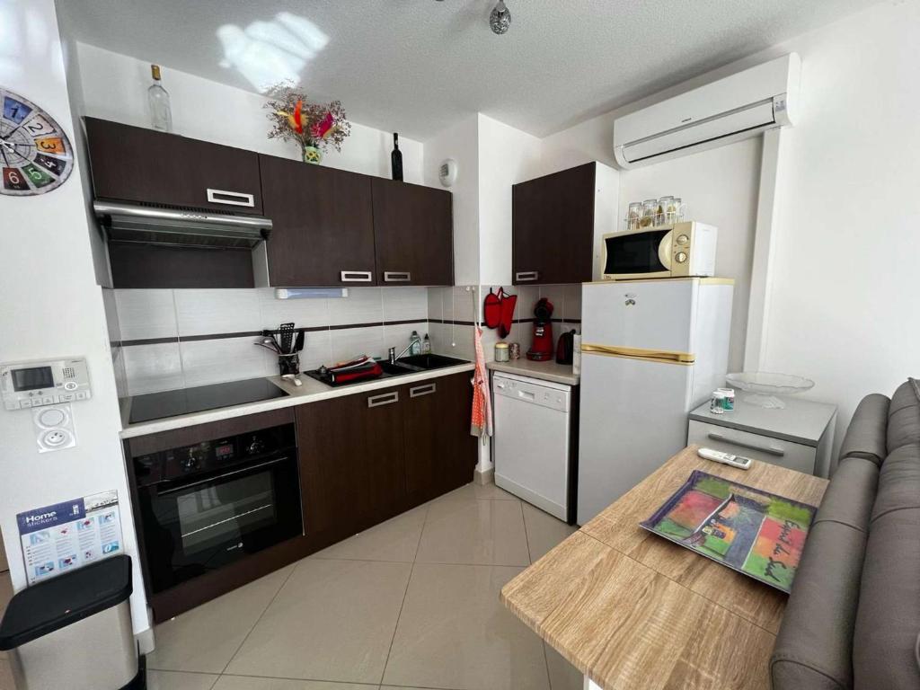 AIG 84 – Appartement T3 – Résidence Ephyra – Gruissan – 4 personnes - 5