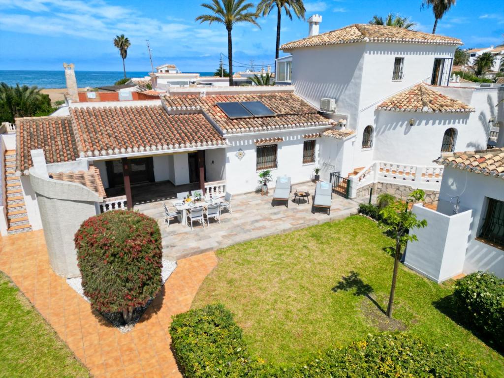 Beachside Villa for 12, 50m to Beach, Private Garden, BBQ, AC, Free WiFi and Parking - 1