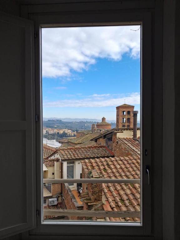 Dimora con finestra sui tetti di Siena - 5