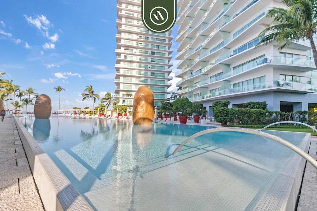Beachfront 1 BR Condo with Multiple Pools - Gym - 1