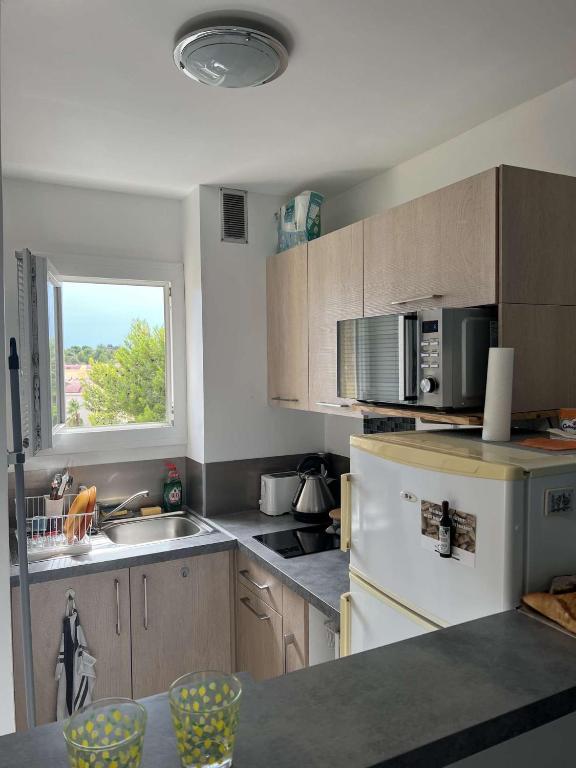 AIG_183 Studio rénové avec terrasse et vue exceptionnelle sur la marina, l’étang et le village de Gruissan - 5