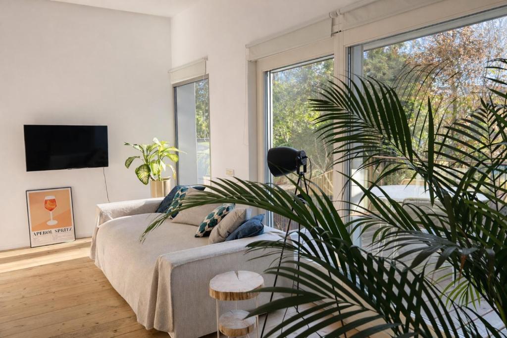 STUDIO 14 - apt design con terrazza sul fiume - 2 biciclette incluse - vicino al centro - 3