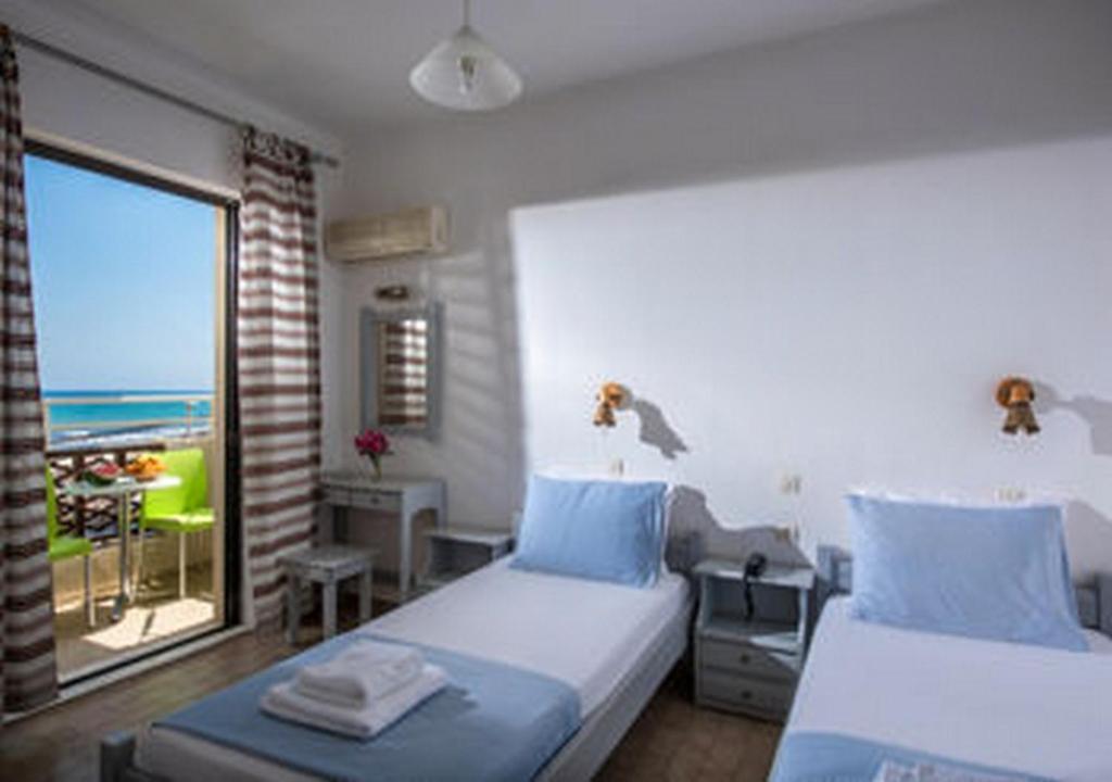 Smaragdine Beach Hotel — Hotel rooms in Stalida