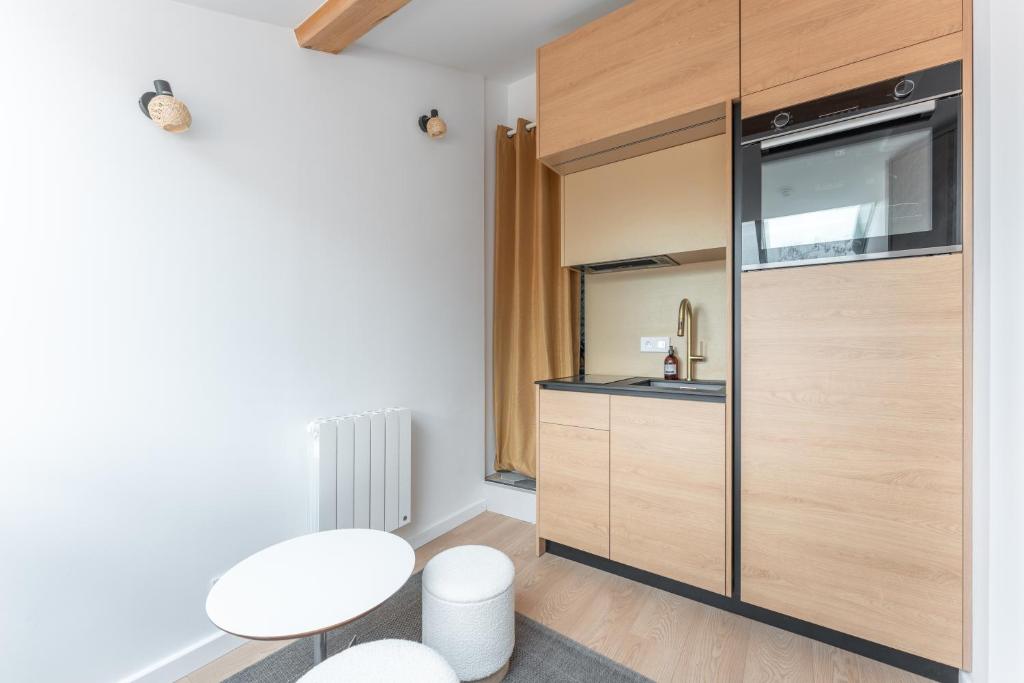 Le Petit Canut - T1 sous les toits avec vue - 4