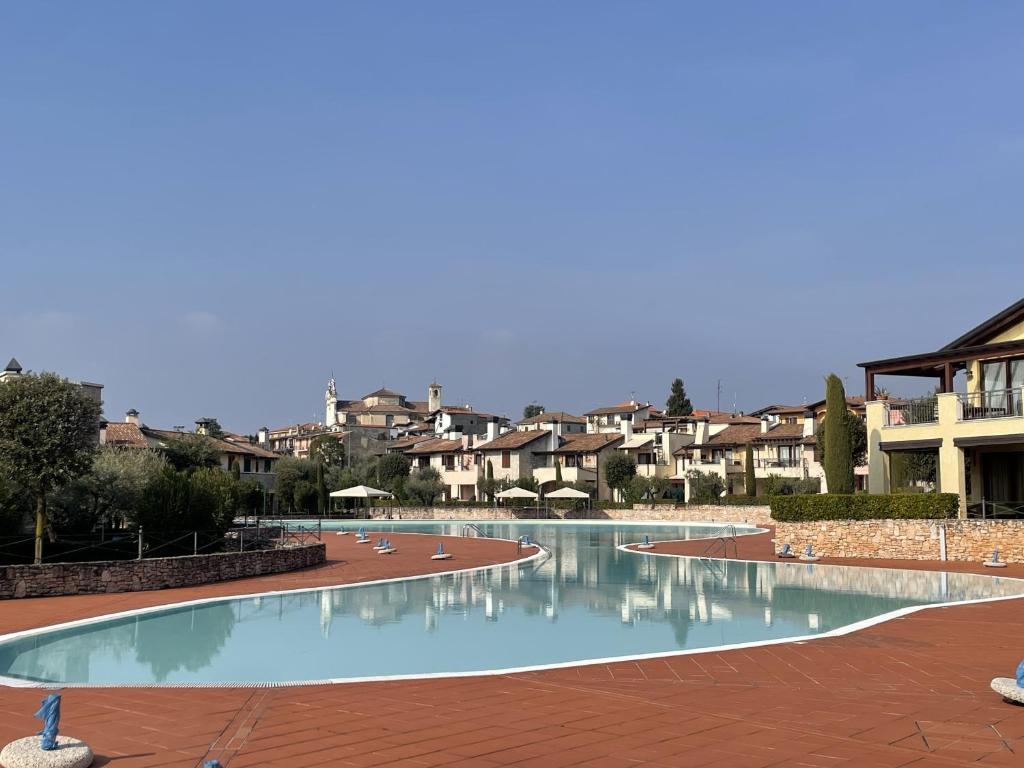 La Rocca di Manerba relaxing pool By Bookinggardalake - 5