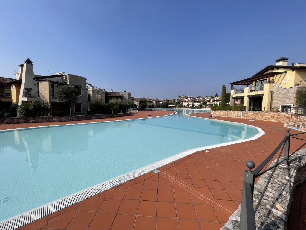 La Rocca di Manerba relaxing pool By Bookinggardalake - 1