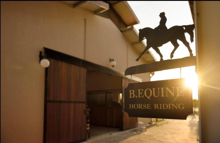 B. Equine Range Hotel photo
