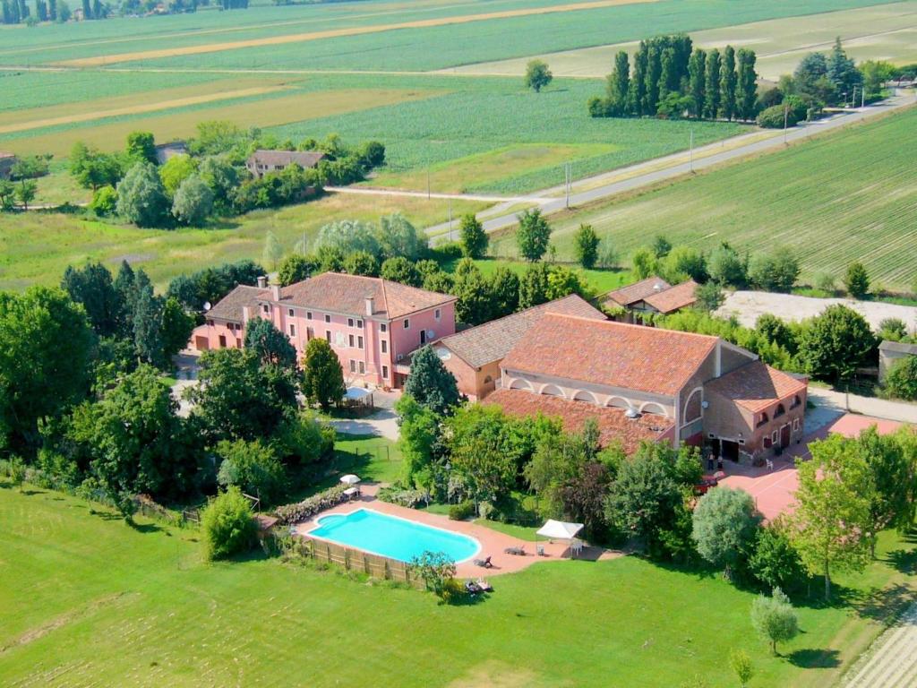 Large property on farmland with swimming pool.