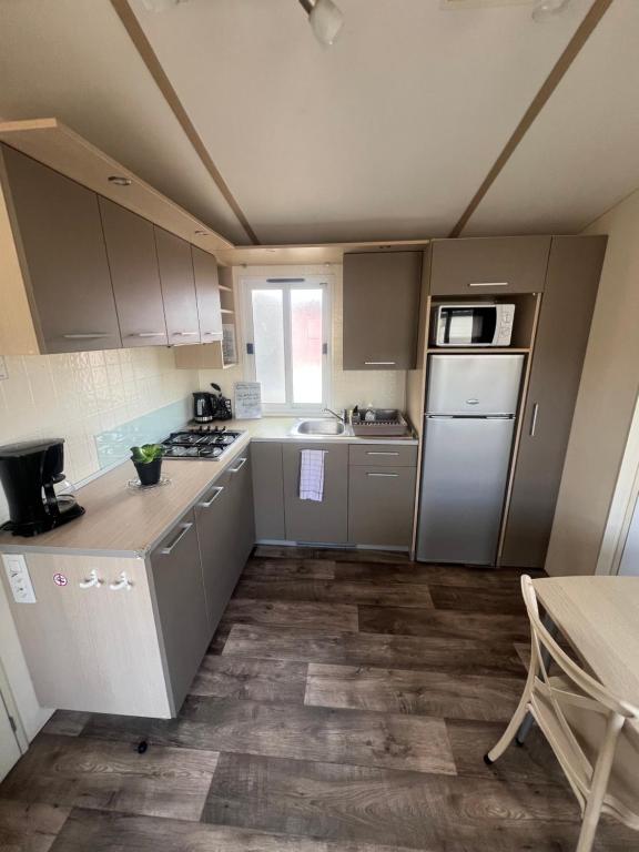 Les mobil homes de NOLY TV CLIM 6places 1 place adulte offerte pour la réserve africaine sigean - 5