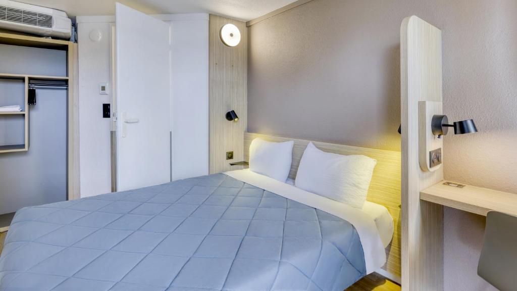 プルミエール クラッセ リヨン エスト アエロポール サン テグジュペリ (Premiere Classe Lyon Est Aeroport Saint Exupery) 客室内ベッド