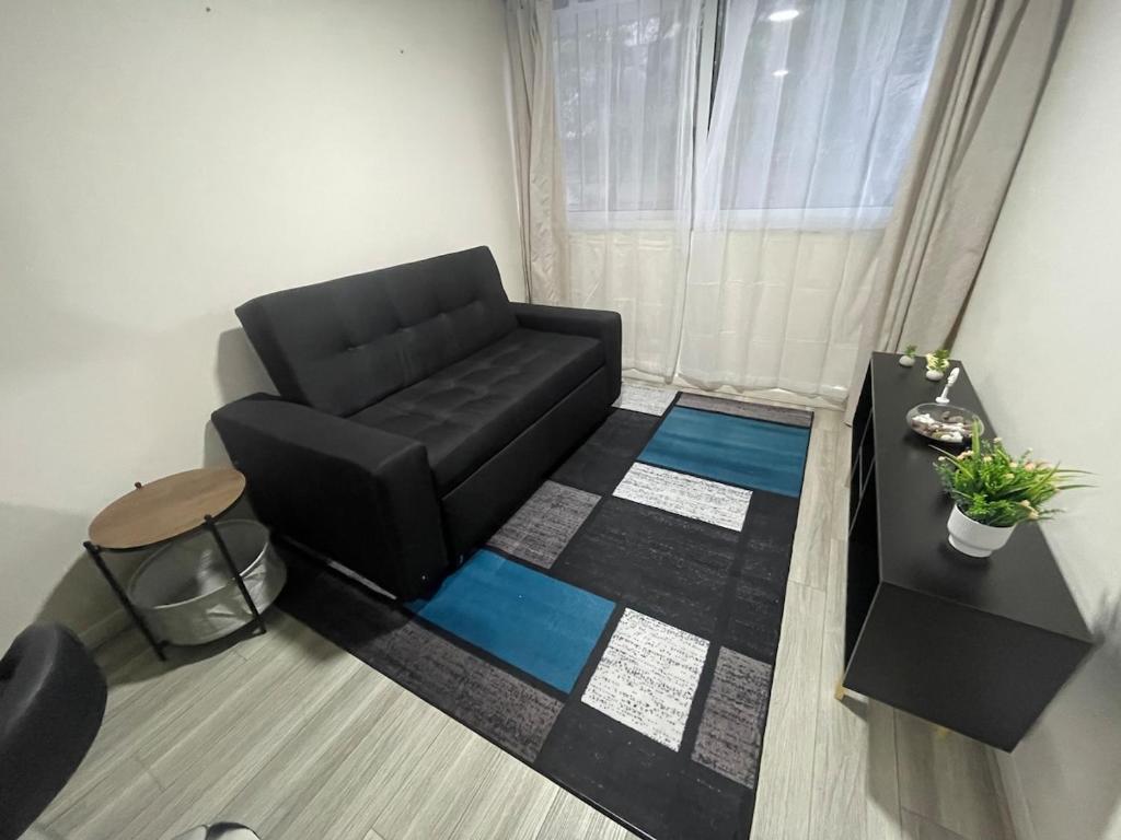 Departamento cerca Movistar Arenas 2 - 3