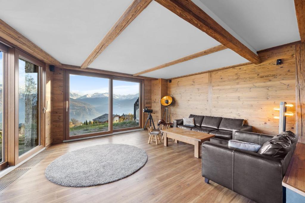 Sagittaire T06 sur la place du village a Anzere avec vue sur les Alpes - 2