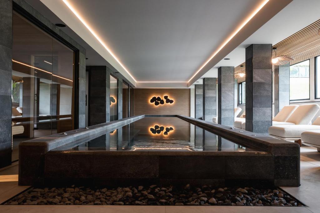 Marins Suites - Adults Only Hotel — Swimming pool in Cala Bona, Balearic Islands