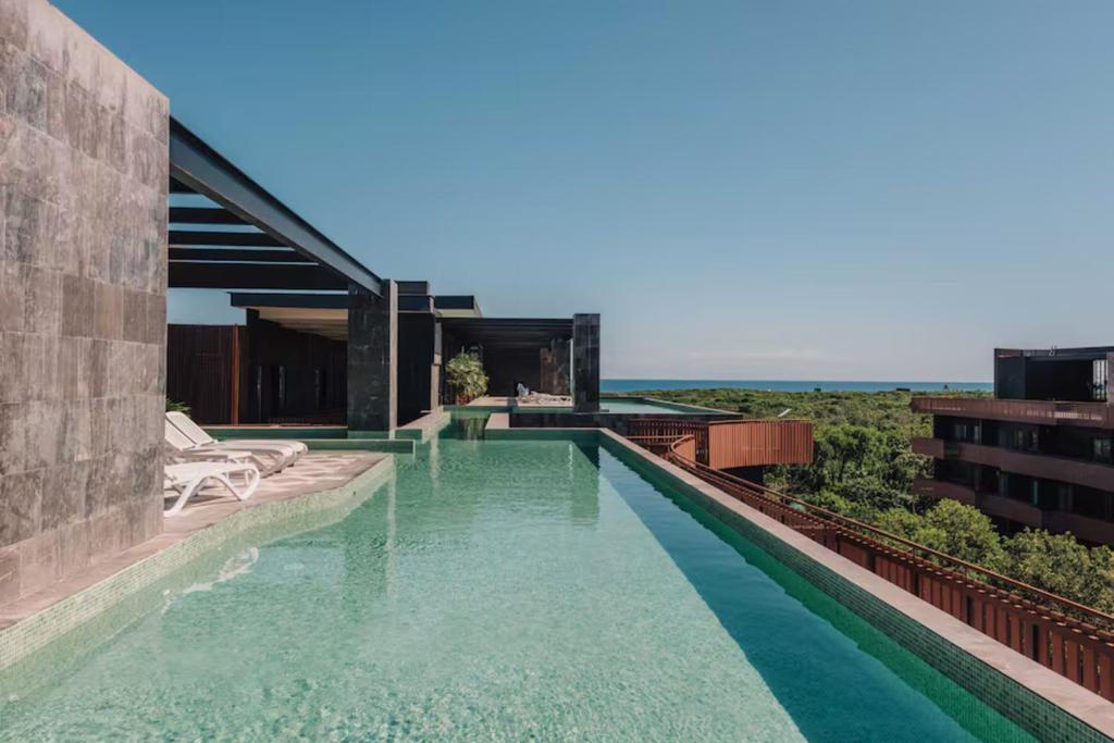 BT Homes - Tulum, Moderno cerca del mar con piscina y balcón - 1