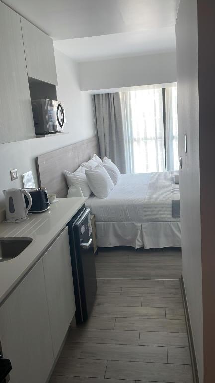 Urban Suites Apart Hotel con Estacionamiento Gratuito - 5