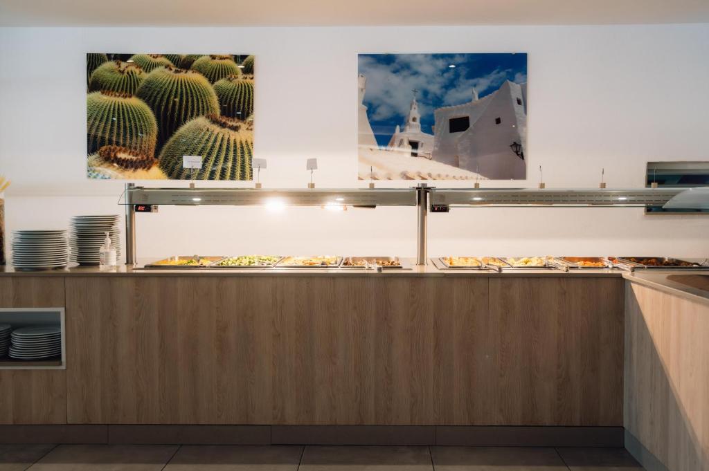 BLUESEA Marina Parc — Restaurant & bars in Arenal d'en Castell, Balearic Islands