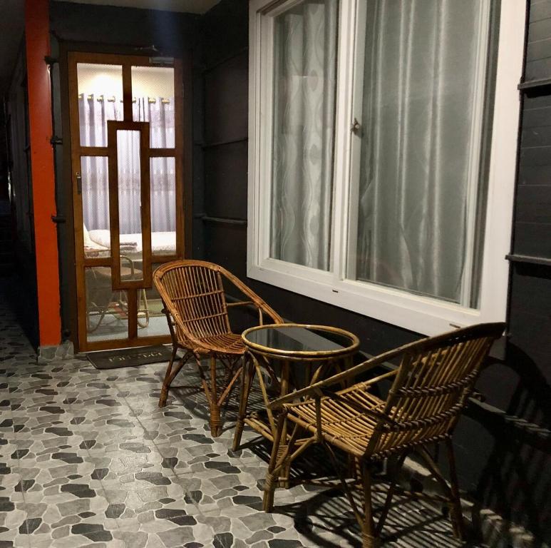 VacationVibeVilla 2R, Balcony, Kitchen, Living — Sauraha (5)