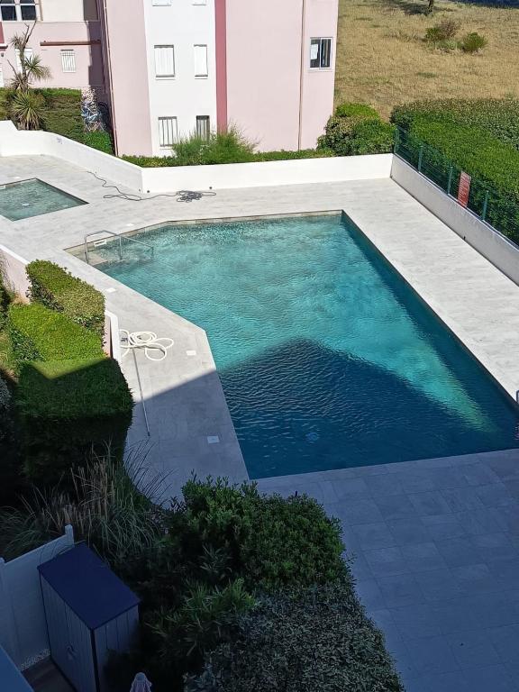 T2 - Les pieds dans le sables en toutes saisons 5 couchages - climatisation - parking privée - piscine - situation optimum et rare - Amoureva - Plage Richelieu- Cap d'Agde - 3