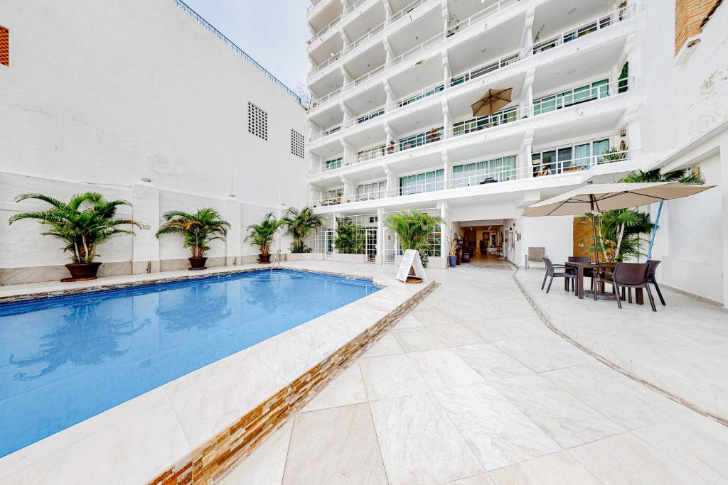 Central Puerto Vallarta condo with pool, ocean views & fast WiFI - walk to beach - 1