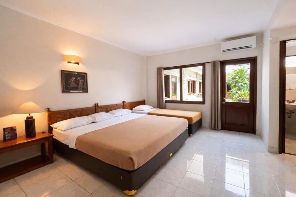 Guestroom, Hotel Winotosastro Garden in Yogyakarta