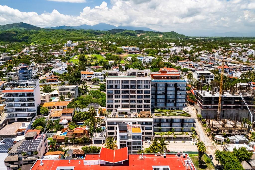 Modern waterfront condo with shared pool, balcony, and washer/dryer - 1