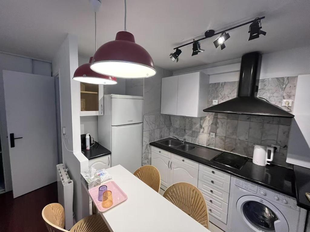 Cozy sunny entire apartment in the 16th arrondissement of Paris with a panoramic view of the Eiffel Tower just 3 minutes from the door Includes kitchen, bathroom, and living room - 2