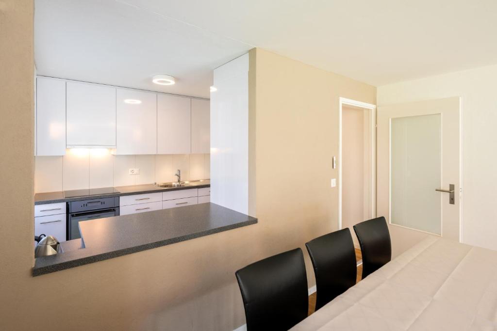4 Zi Familienwohnung Haus Ravaisch 14 Davos Dorf EG - 4