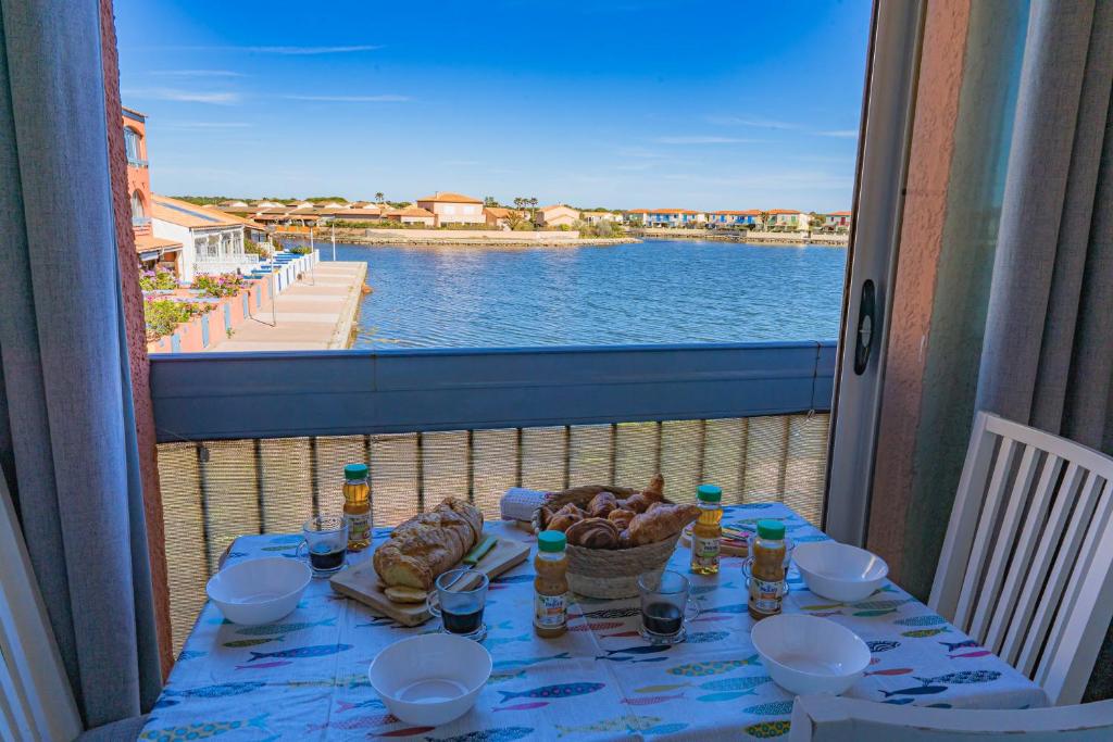 Le Marina Blue Vista - Vue Etang - Place de parking privé - Plage à 5 min - Climatisation - Wifi - 5