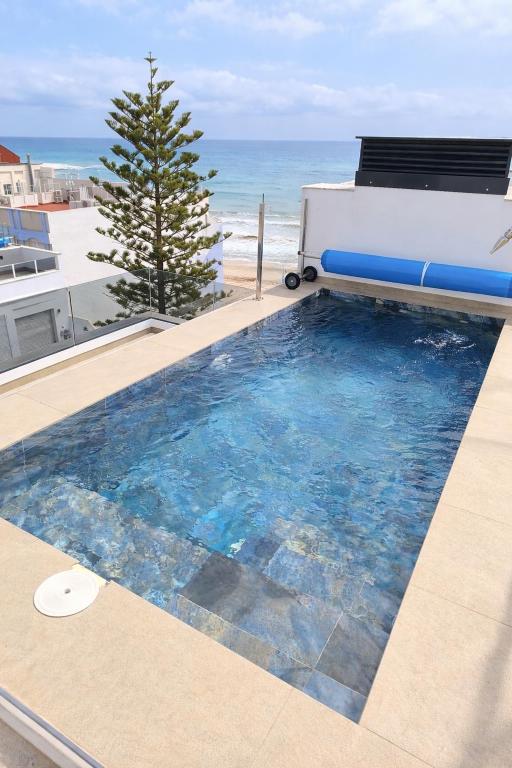 Sunny Waves & Coast 2 Apts, 6BR, AC & Heated POOL - 4