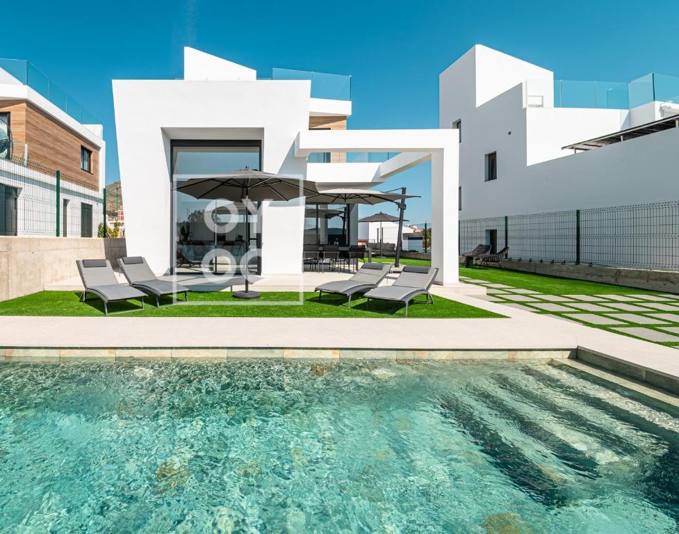 Sierra y Sal - designer villa, heated saltwater pool, mountain and sea views - by OYOOSTAYS - 1