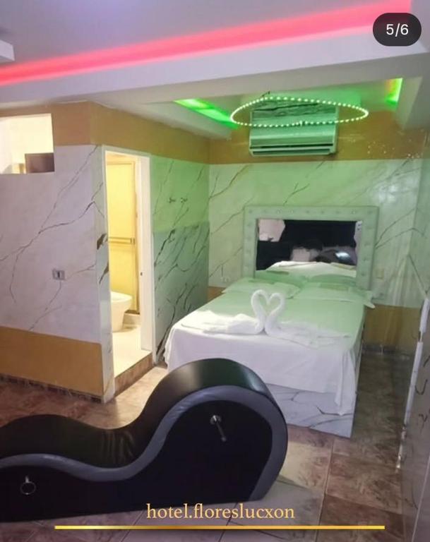 HOTEL FLORES LUCXON, ca - 1