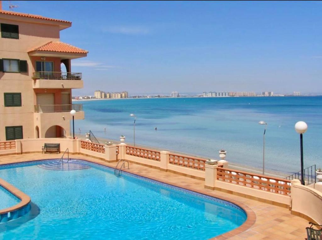 Beachfront 3BR Condo with Pool Views, Sleeps 10 - 1
