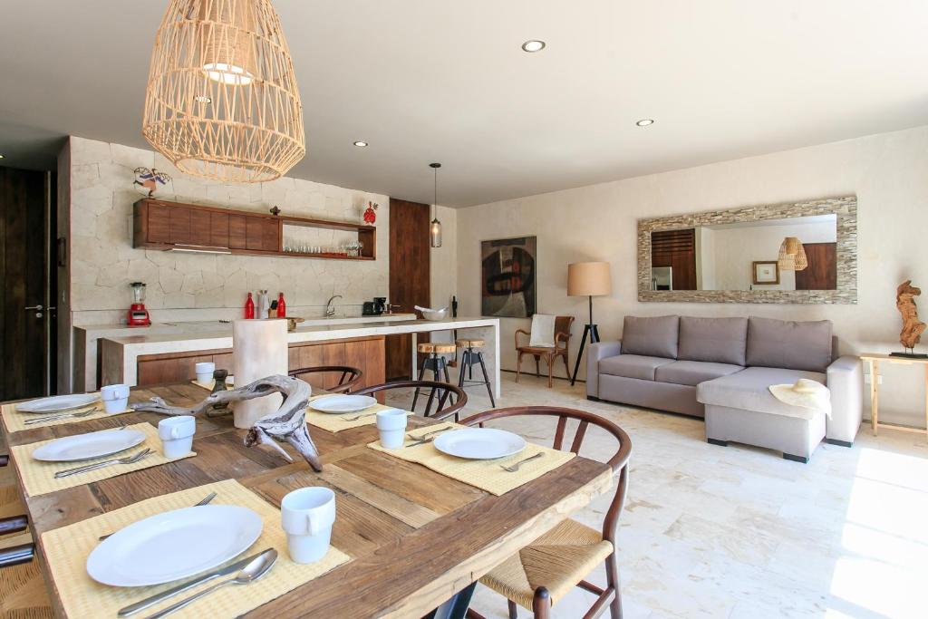 Kitchen, Eco-chic Design Condos Wrapped in Nature's Elements by Stella Rentals in Tulum