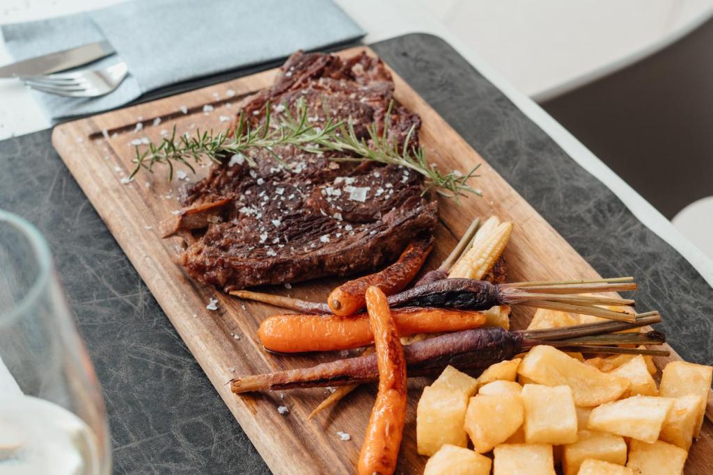 Petit Sagitario Adults only — Restaurant & bars in Santandria, Balearic Islands