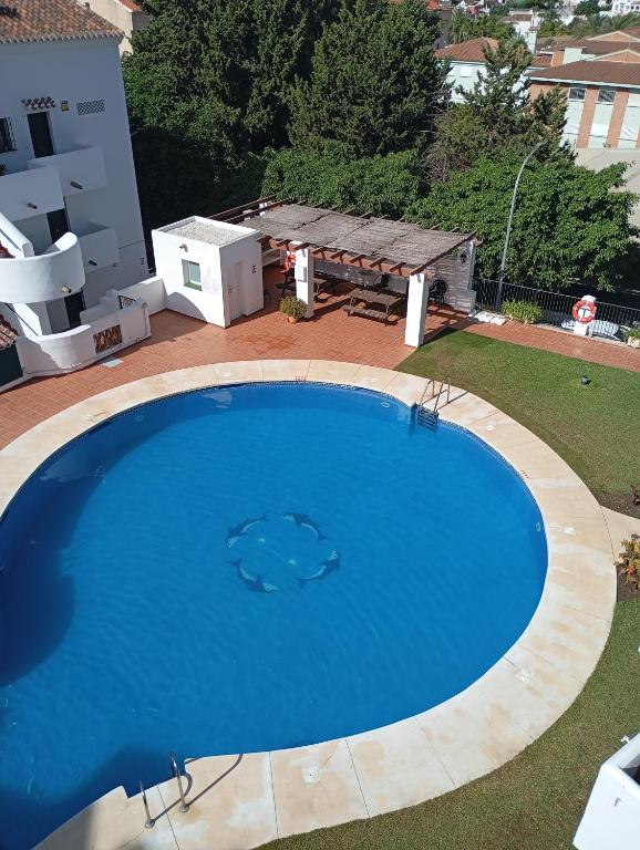Pool-View Apartment with Terrace & Lift in Pueblo del Parque - 5