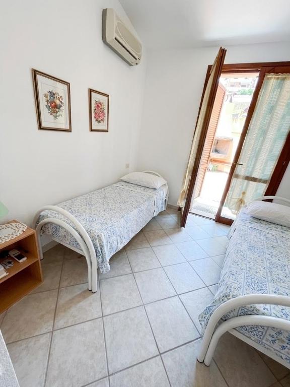 Casa al piano terra con 2 camere da letto, parcheggio privato e piscina condominiale - 5