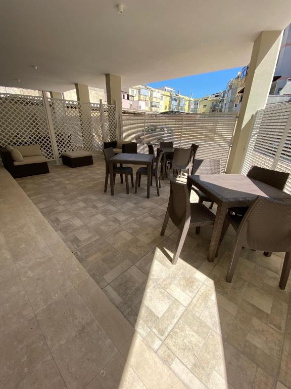 SEAL DOMO - Appartamento con Patio e Parcheggio Privato a Cagliari - 1