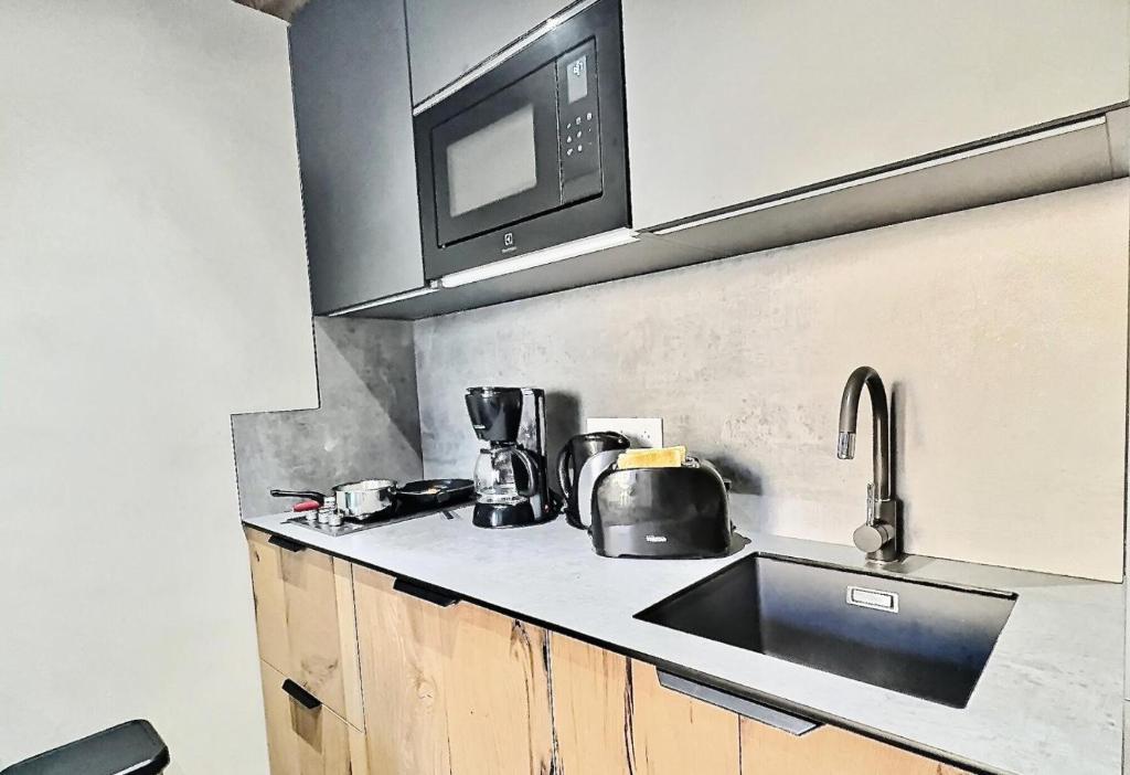 Résidence Le Rosset - Studio 4 personnes à Tignes proche des commerces, des pistes et de l'agence CIS dans le quartier du Rosset.Grand studio de 28m², MAE-2111 - 5