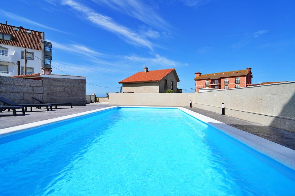 Apartamentos con piscina frente a la Playa de Paxariñas - 4