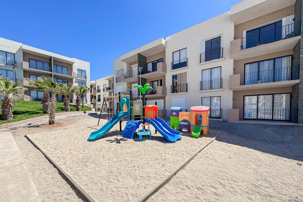 Bright and Modern Condo w/ Balcony, Shared Pool, A/C, minutes to Beach & Town - 5