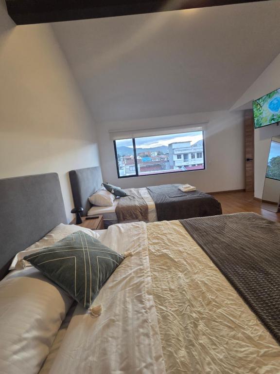 Suite Dúplex Tipo Loft, 6 minutos Parque Calderon56 - 1