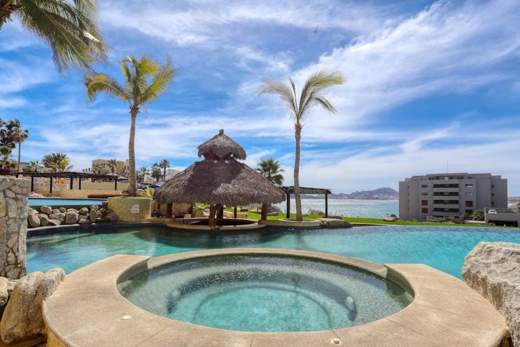 Stylish Coastal Retreat with Breathtaking Views, Resort Pool & Private Balcony - 1
