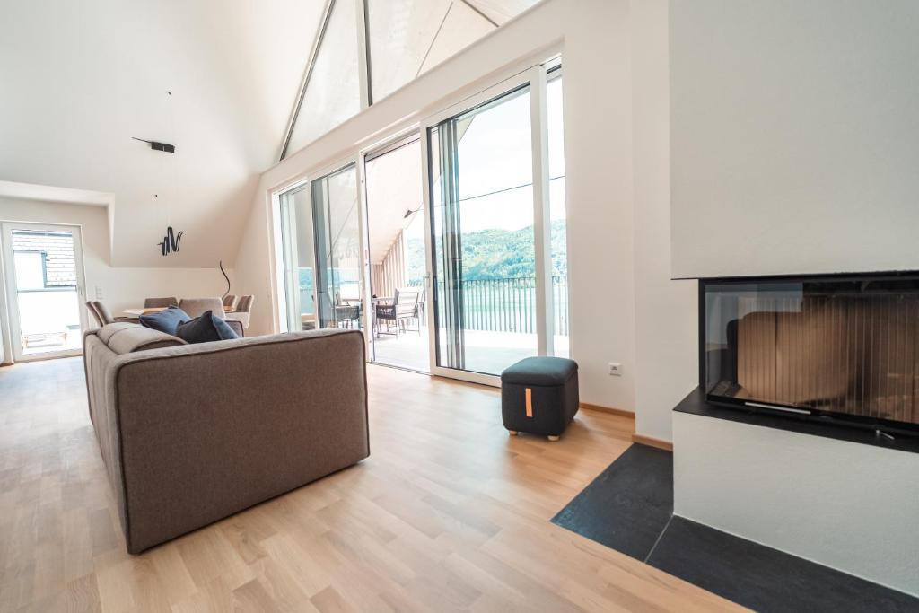 Montelago, Penthouse am Ossiacher See mit Kamin, Seeblick, Seezugang - 4