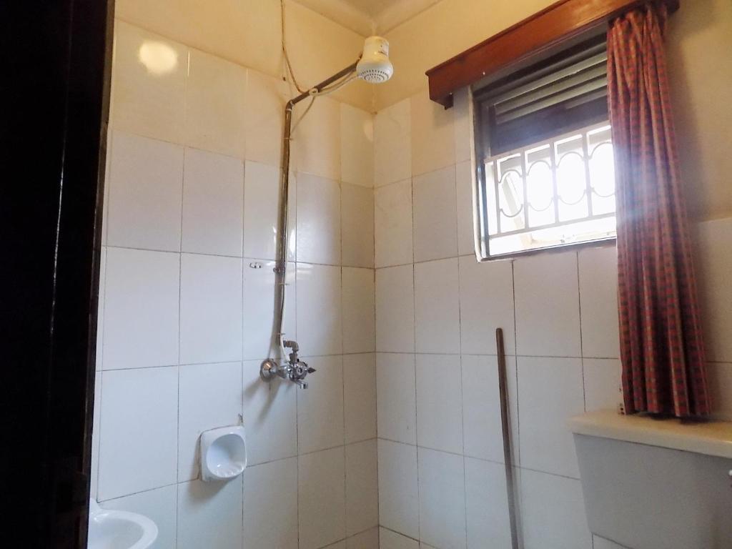 Rosama Guest House Najjanankumbi Kampala photo