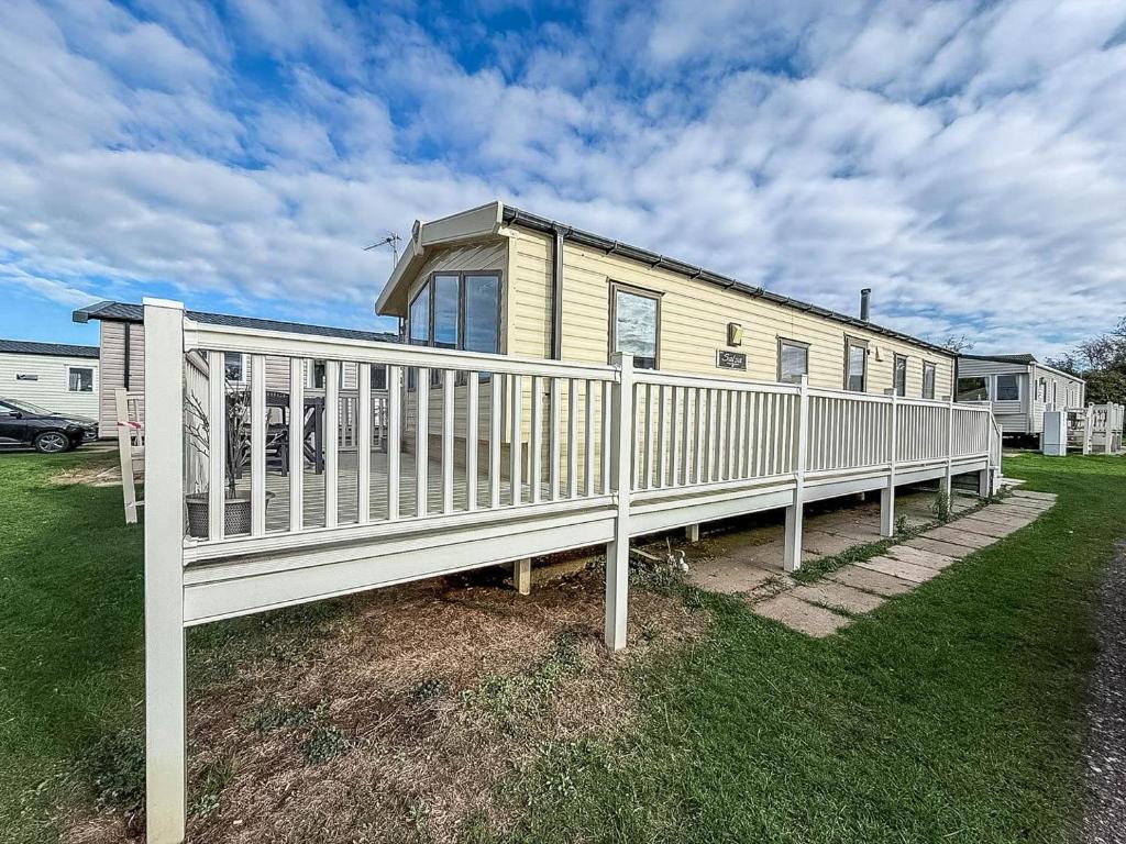 Caravan with enclosed decking at Manor Park, Hunstanton - pet-friendly stay