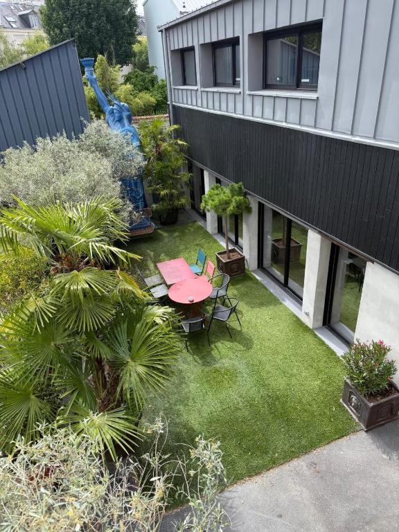 Loft rare - Jardin privatif - 2 parkings - Reims - 2