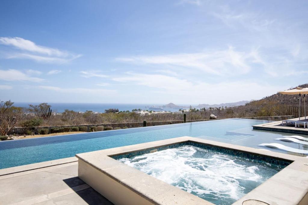 Condo con vista al arco, piscina infinity y spa - 1